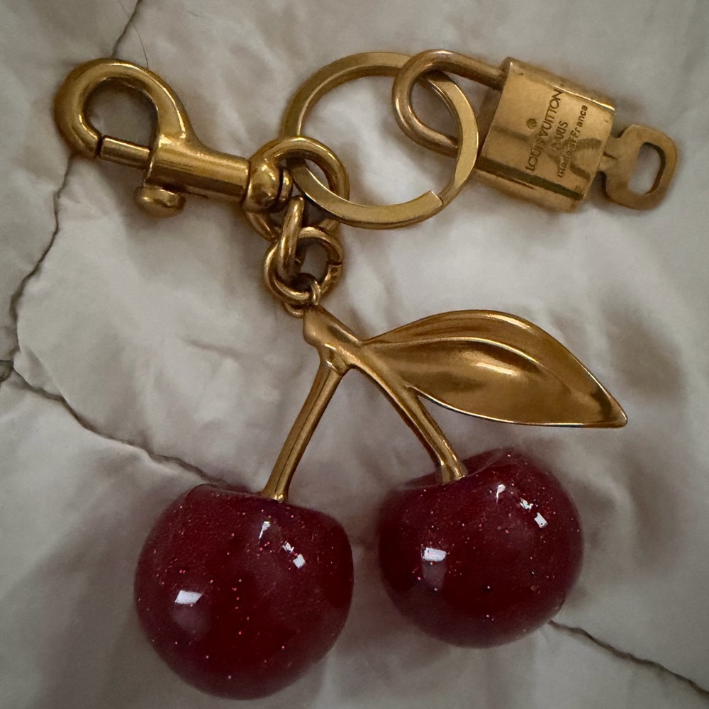 Louis Vuitton Lock & Key (315) with Red Cherry Bag Charm with Gold Accents